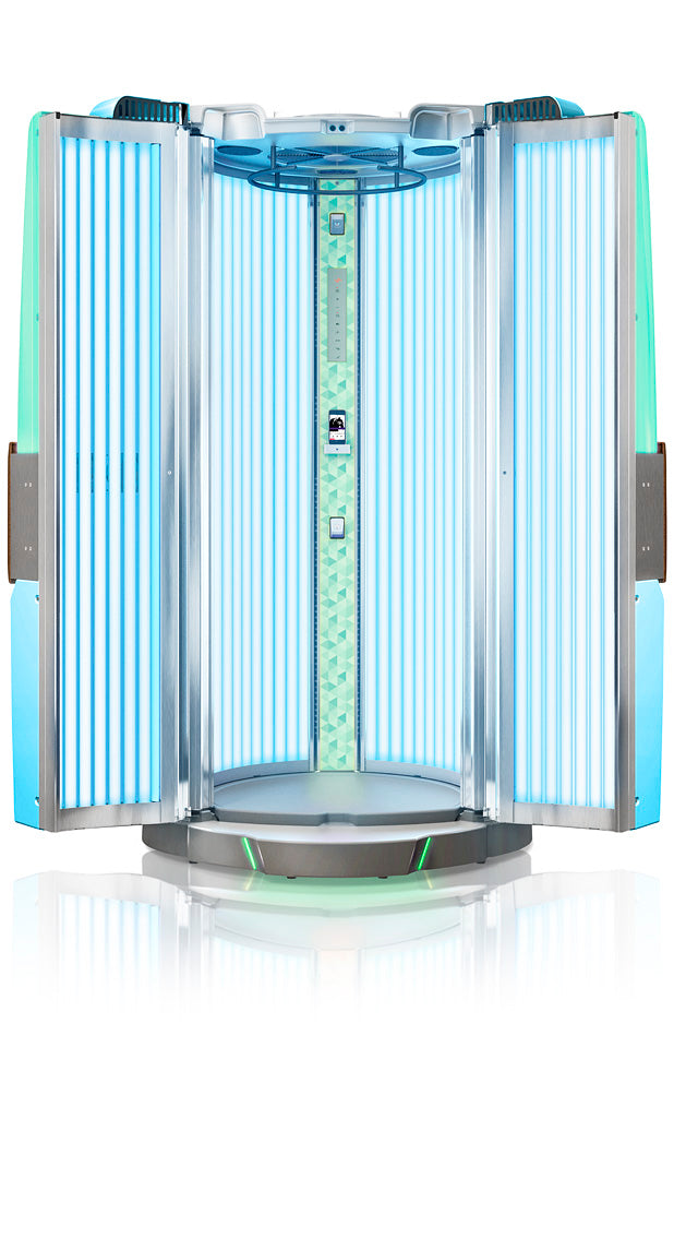 Luxura V8 tanning booth fully open, displaying blue vertical tanning lamps and a patterned green central control column.